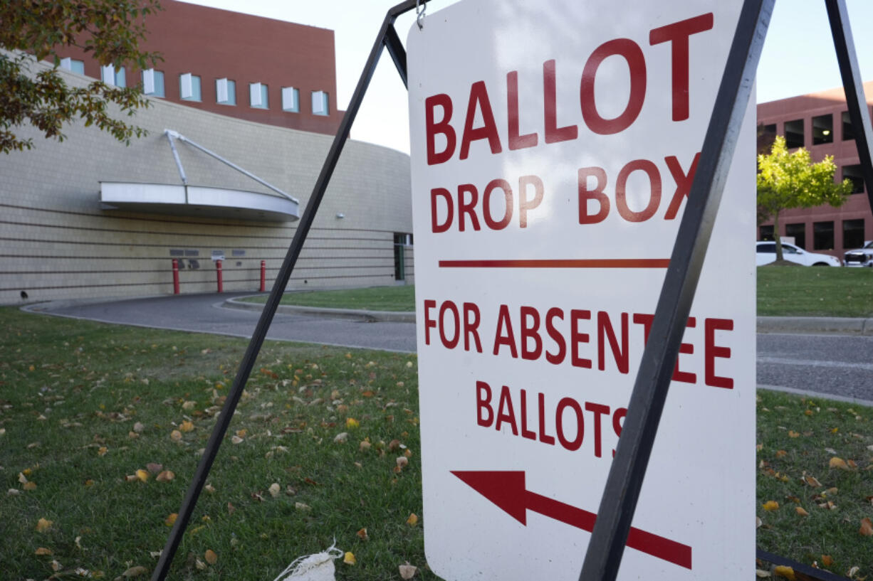 A drop slot for voting ballots and absentee applications is shown outside of the Warren City Hall complex Thursday, Oct. 24, 2024, in Warren, Mich.