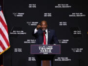 FILE - North Carolina Republican gubernatorial candidate Lt. Gov. Mark Robinson speaks before Republican presidential nominee former president Donald Trump in Asheville, N.C., Aug. 14, 2024.