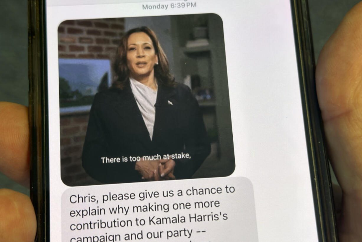 A text is viewed on a mobile device Wednesday, Oct. 30, 2024, in Washington, as across the U.S., people&rsquo;s phones are pinging with text messages from Donald Trump, Kamala Harris and their allies in the presidential campaign&rsquo;s final days.