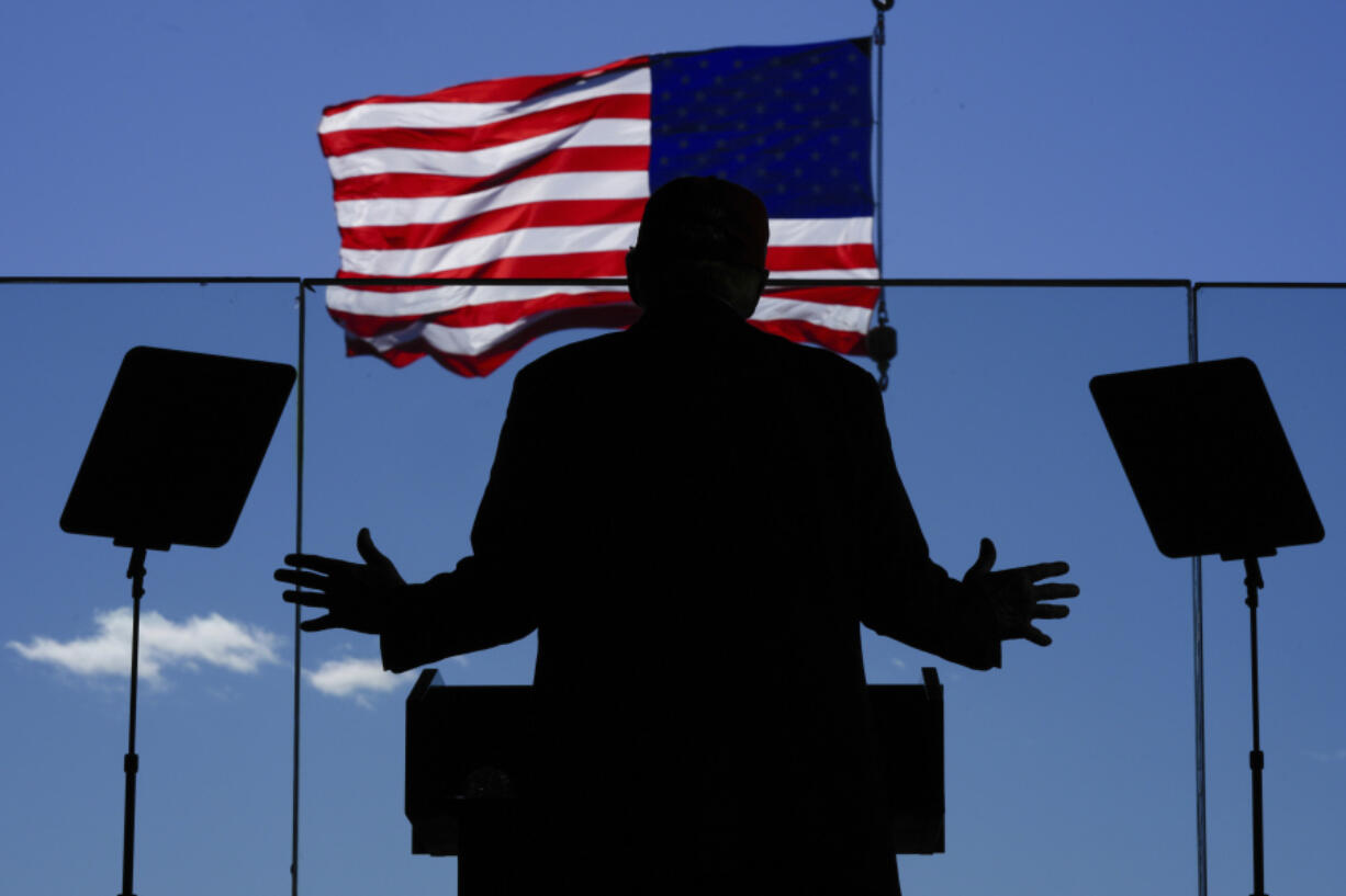 Republican presidential nominee former President Donald Trump speaks during a campaign rally at Dodge County Airport, Sunday, Oct. 6, 2024, in Juneau, Wis.