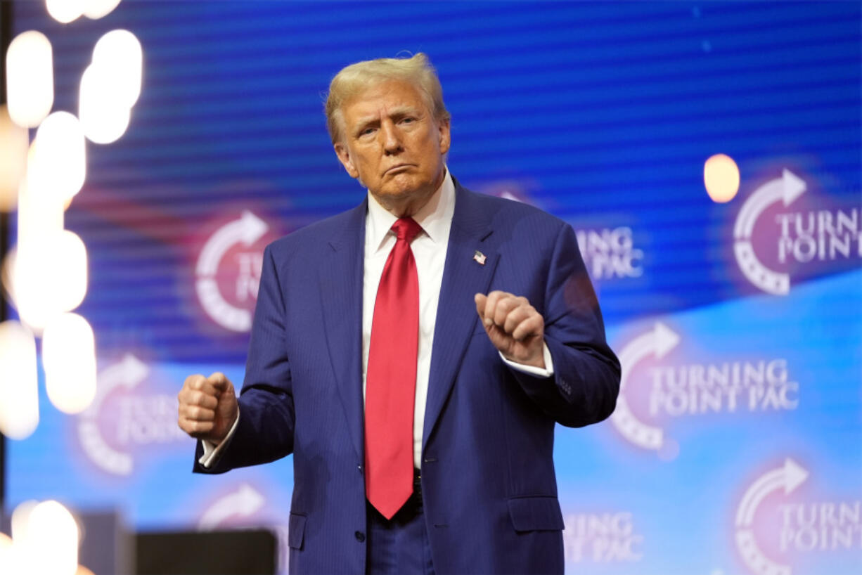 Republican presidential nominee former President Donald Trump dances at a campaign rally Wednesday, Oct. 23, 2024, in Duluth, Ga.