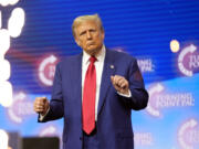 Republican presidential nominee former President Donald Trump dances at a campaign rally Wednesday, Oct. 23, 2024, in Duluth, Ga.