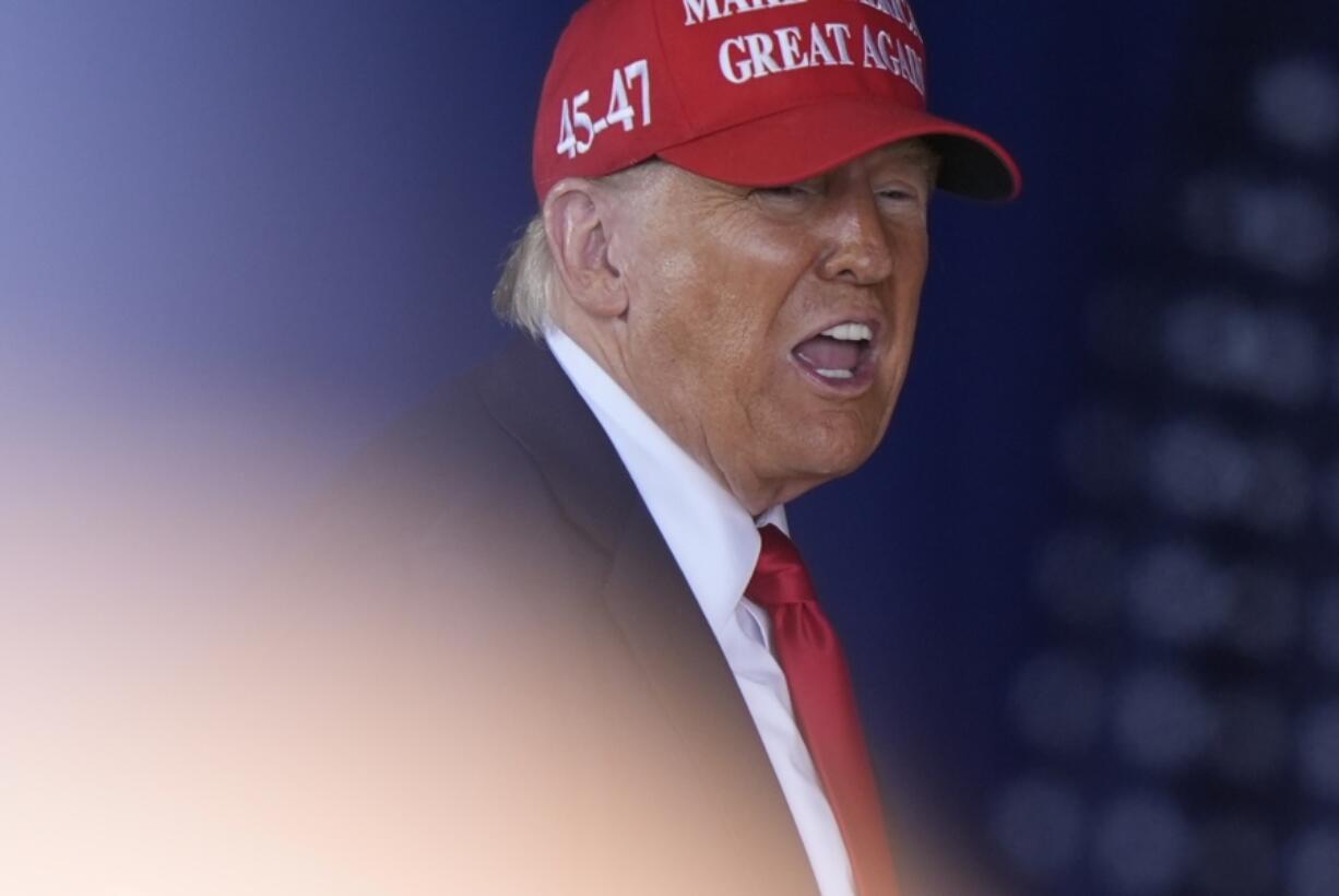 Republican presidential nominee former President Donald Trump speaks at a campaign stop at the Dodge County Airport Sunday, Oct. 6, 2024, in Juneau, Wis.