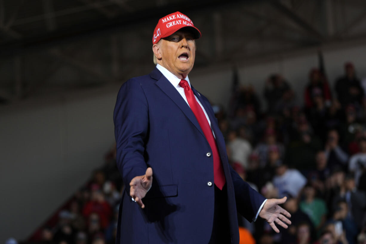 Republican presidential nominee former President Donald Trump arrives to speak during a campaign rally at Dodge County Airport, Sunday, Oct. 6, 2024, in Juneau, Wis.