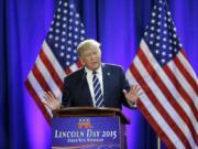 FILE - Republican presidential candidate Donald Trump addresses a GOP fundraising event, Aug 11, 2015, in Birch Run, Mich.