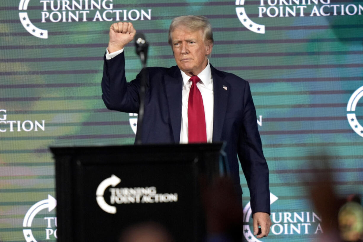 FILE - Republican presidential candidate former President Donald Trump gestures as he finishes speaking at The Believers&rsquo; Summit 2024 at a Turning Point Action event in West Palm Beach, Fla., July 26, 2024.