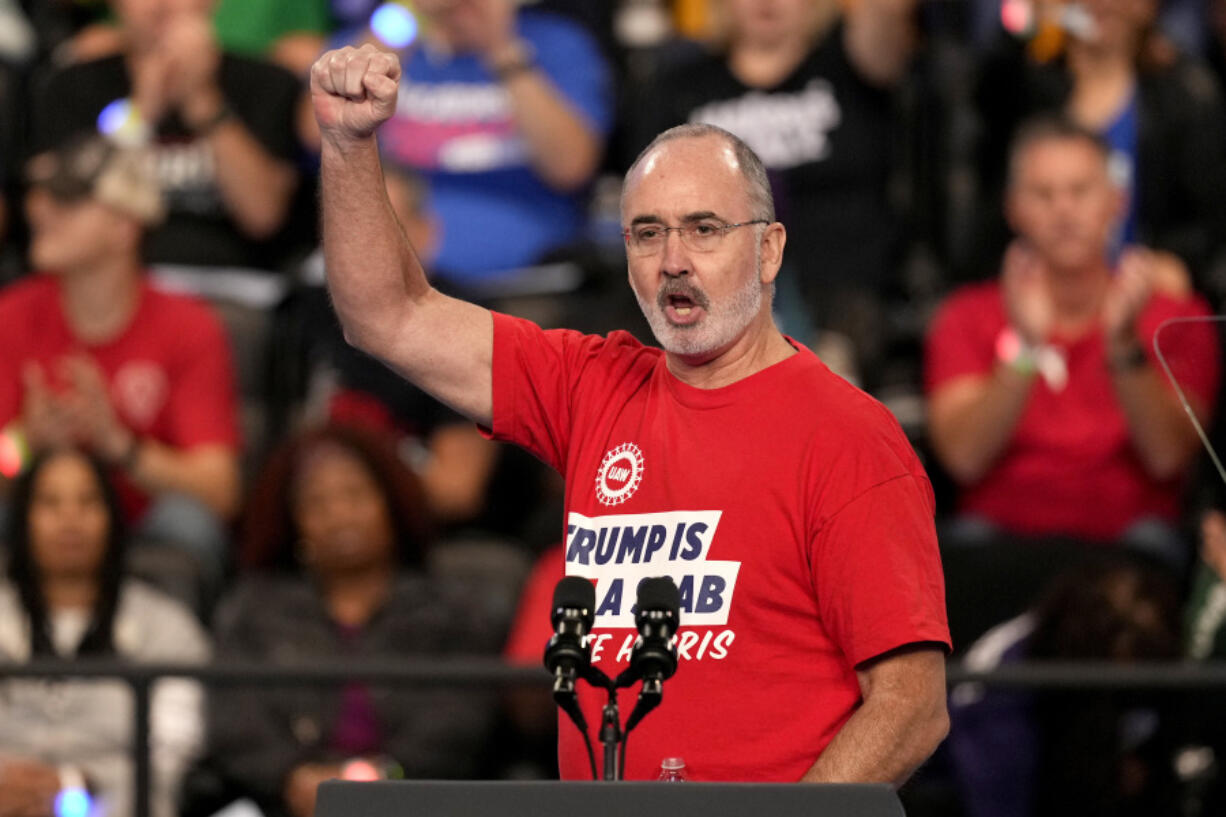 FILE - United Auto Workers President Shawn Fain speaks at a campaign rally for Democratic presidential nominee Vice President Kamala Harris at the Dort Financial Center in Flint, Mich., Oct. 4, 2024.