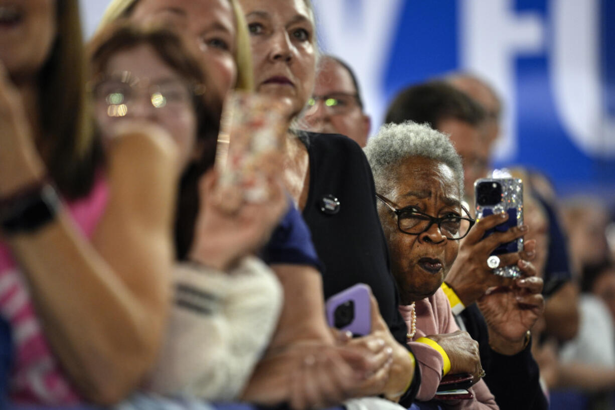 Attendees listen as Democratic vice presidential candidate Minnesota Gov. Tim Walz speaks during a campaign event in York, Pa., Wednesday, Oct. 2, 2024.