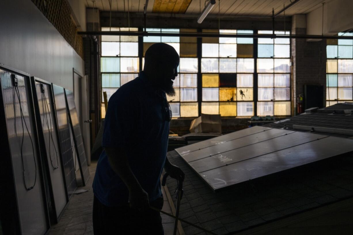 Jackie Robinson, an instructor at the Energy Coordinating Agency, a nonprofit focused in part on energy equity, works inside the facility on Tuesday, July 2, 2024 in Philadelphia.