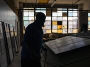 Jackie Robinson, an instructor at the Energy Coordinating Agency, a nonprofit focused in part on energy equity, works inside the facility on Tuesday, July 2, 2024 in Philadelphia.