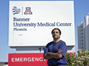 Dr. Aneesh Naran stands outside the Banner University Medical Center emergency room after his shift, Monday, Oct. 7, 2024 in Phoenix.