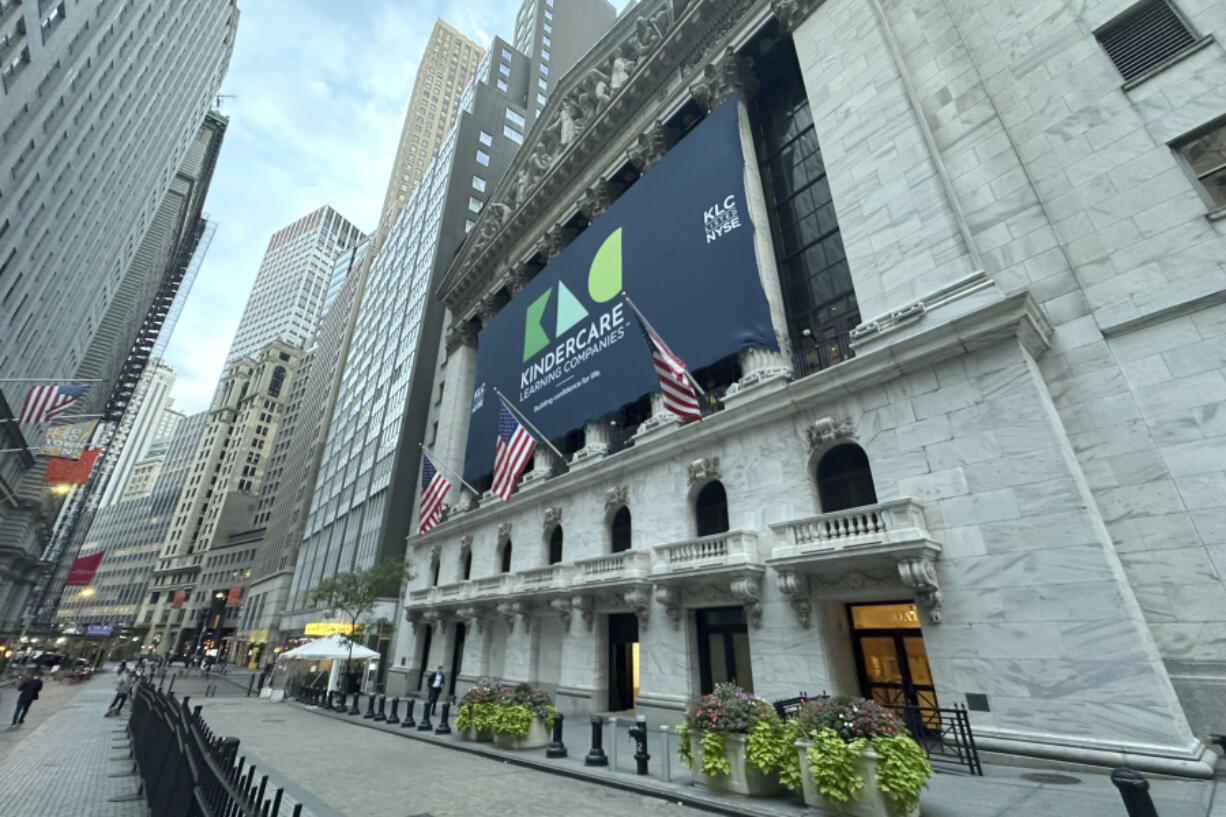 A banner for childhood learning company KinderCare hangs from the New York Stock Exchange ahead of the company&rsquo;s IPO on Wednesday, Oct. 9, 2024.