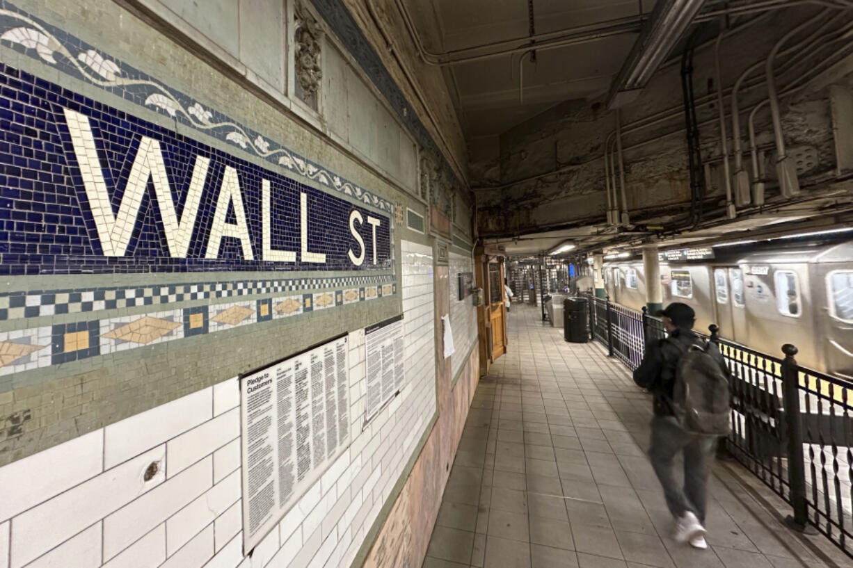 Passengers leave a train at the Wall St. subway station in New York&rsquo;s Financial District on Wednesday, Oct. 9, 2024.