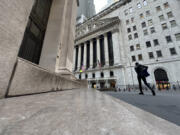 The New York Stock Exchange, rear, is shown on Tuesday, Oct. 8, 2024, in New York.