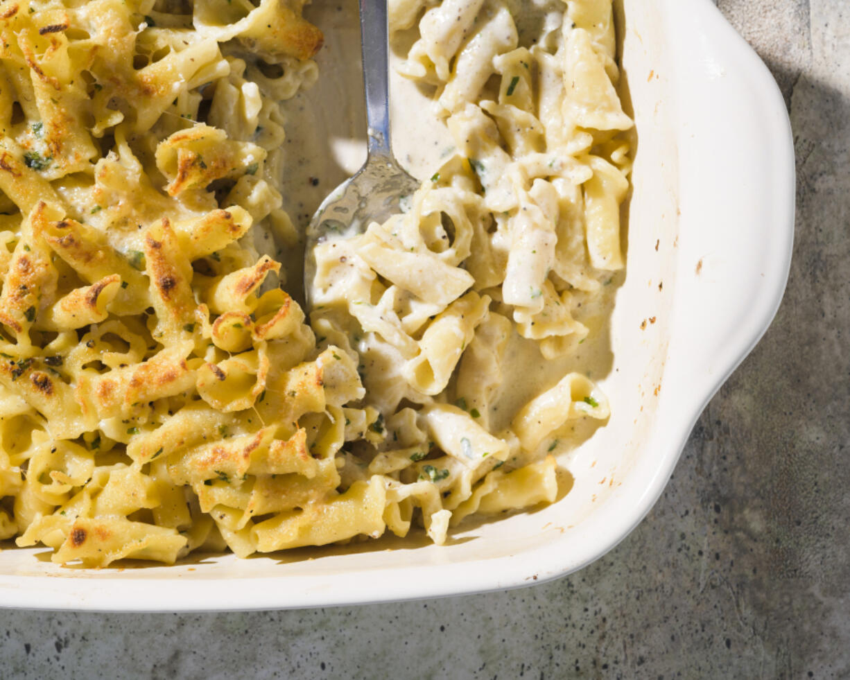 This image released by Milk Street shows a recipe for creamy four cheese pasta.