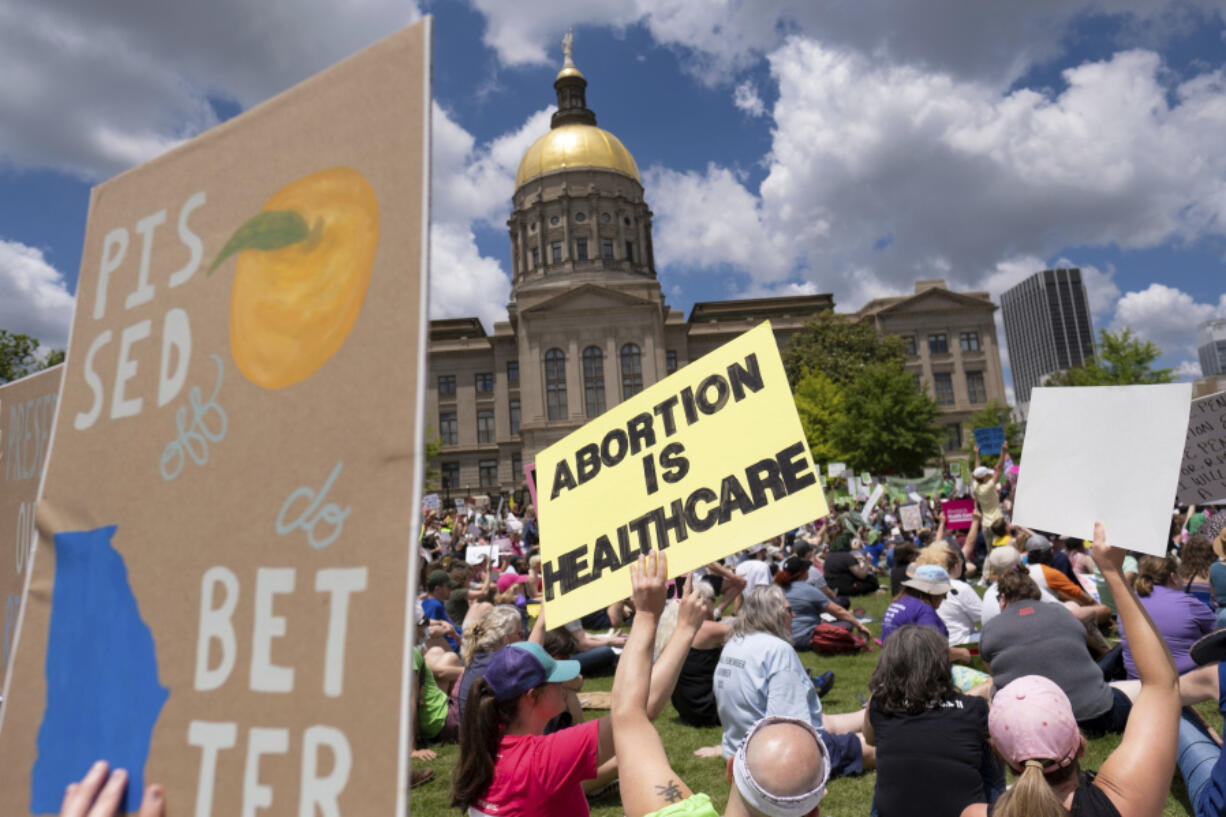 FILE - Abortion rights protesters rally near the Georgia state Capitol in Atlanta, on May 14, (Ben Gray/Atlanta Journal-Constitution via AP)