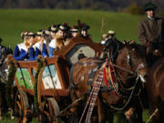 Women in traditional costumes of the region take part at the Leonhardi pilgrimage Oct. 27 in Warngau near Munich, Germany.