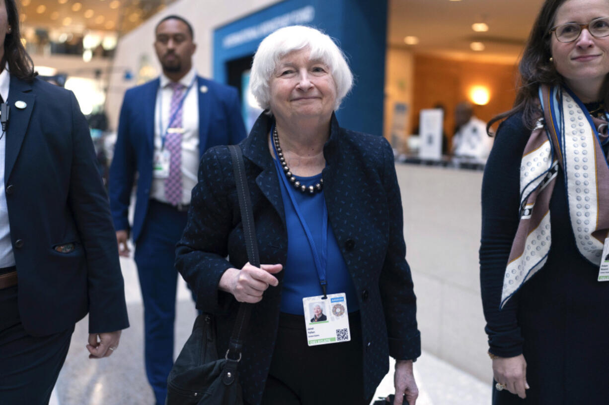 Secretary of the Treasury Janet Yellen, center, leaves the G20 meeting during the World Bank/IMF Annual Meetings in Washington, Thursday, Oct. 24, 2024.