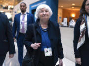 Secretary of the Treasury Janet Yellen, center, leaves the G20 meeting during the World Bank/IMF Annual Meetings in Washington, Thursday, Oct. 24, 2024.