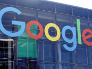 FILE - A sign is shown on a Google building at their campus in Mountain View, Calif., on Sept. 24, 2019.