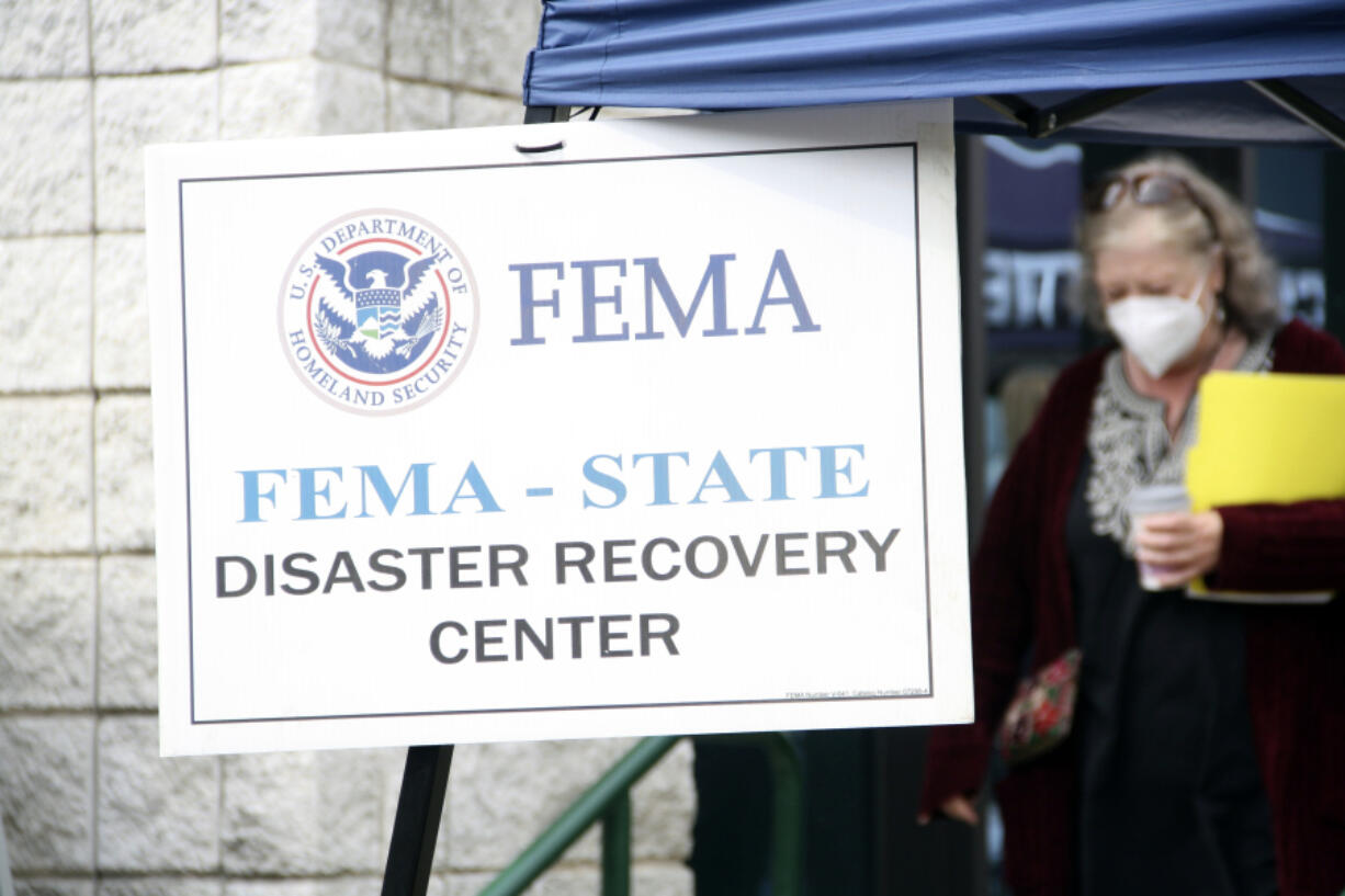 People gather at a FEMA Disaster Recovery Center at A.C. Reynolds High School in Asheville, N.C.,, Tuesday, Oct. 15, 2024.