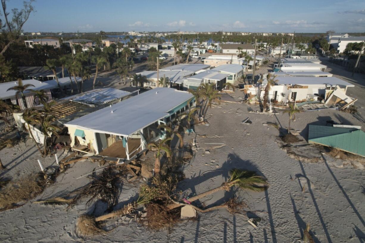 Damage from Hurricane Milton is seen at a mobile home community on Manasota Key, in Englewood, Fla., Sunday, Oct. 13, 2024.