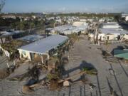 Damage from Hurricane Milton is seen at a mobile home community on Manasota Key, in Englewood, Fla., Sunday, Oct. 13, 2024.