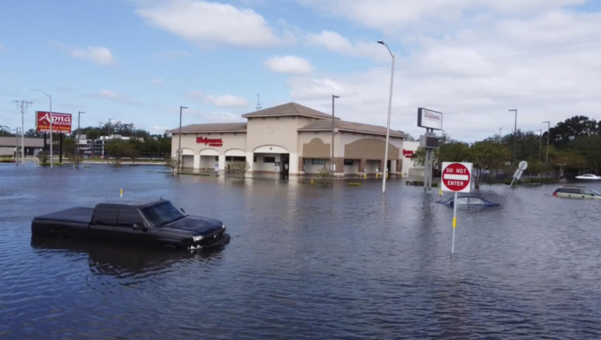 This drone image provided by Kairat Kassymbekov shows flooding from Hurricane Milton in Tampa, Fla., Thursday, Oct. 10, 2024.