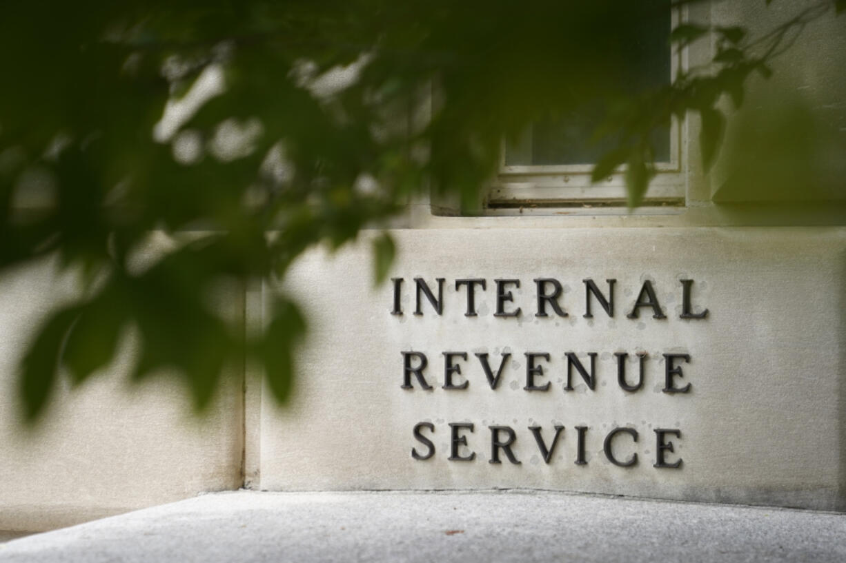 FILE - A sign is displayed outside the Internal Revenue Service building May 4, 2021, in Washington. On Friday, Aug. 19, 2022.