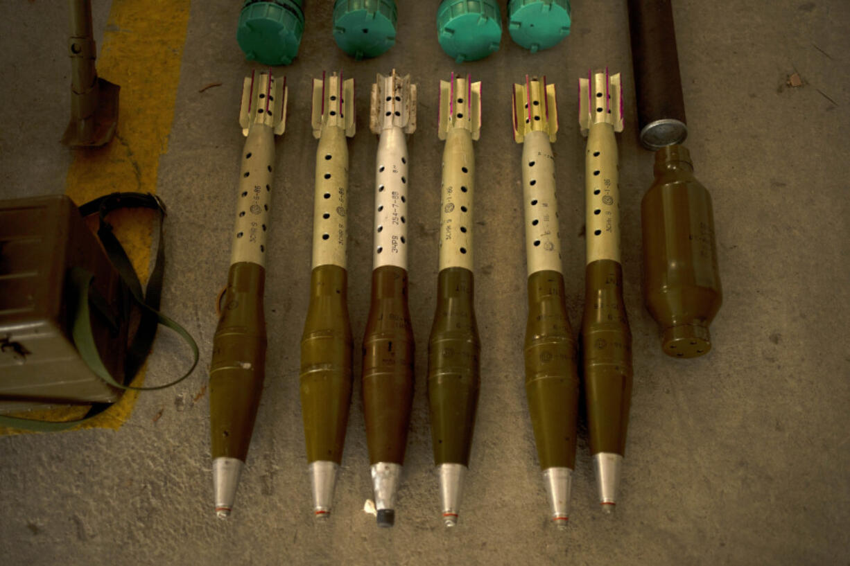 The Israeli Defense Forces display weapons seized in Lebanon on a base in southern Israel, Wednesday, Oct. 9, 2024.