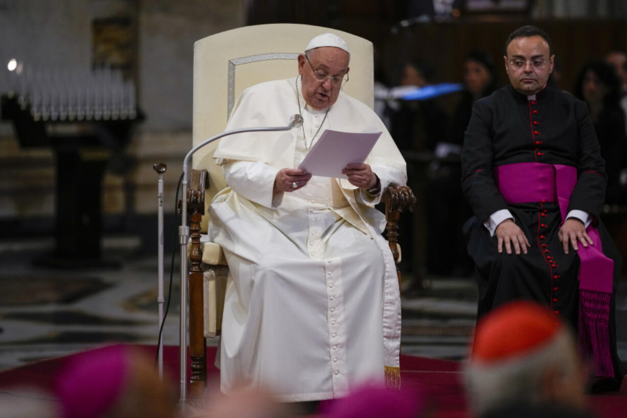 Pope Francis attends a prayer for peace Sunday at Rome&rsquo;s St. Mary Major Basilica.