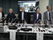 Terumi Tanaka, center, co-chairperson of Nihon Hidankyo and other senior members attend a press conference in Tokyo, Saturday, Oct. 12, 2024, a day after Nihon Hidankyo, an organization of survivors of the two U.S. atomic bombings, won the Nobel Peace Prize.