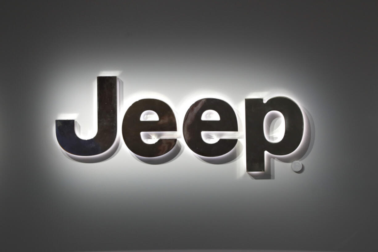 FILE - A Jeep logo is displayed at the North American International Auto Show in Detroit, Jan. 14, 2019.