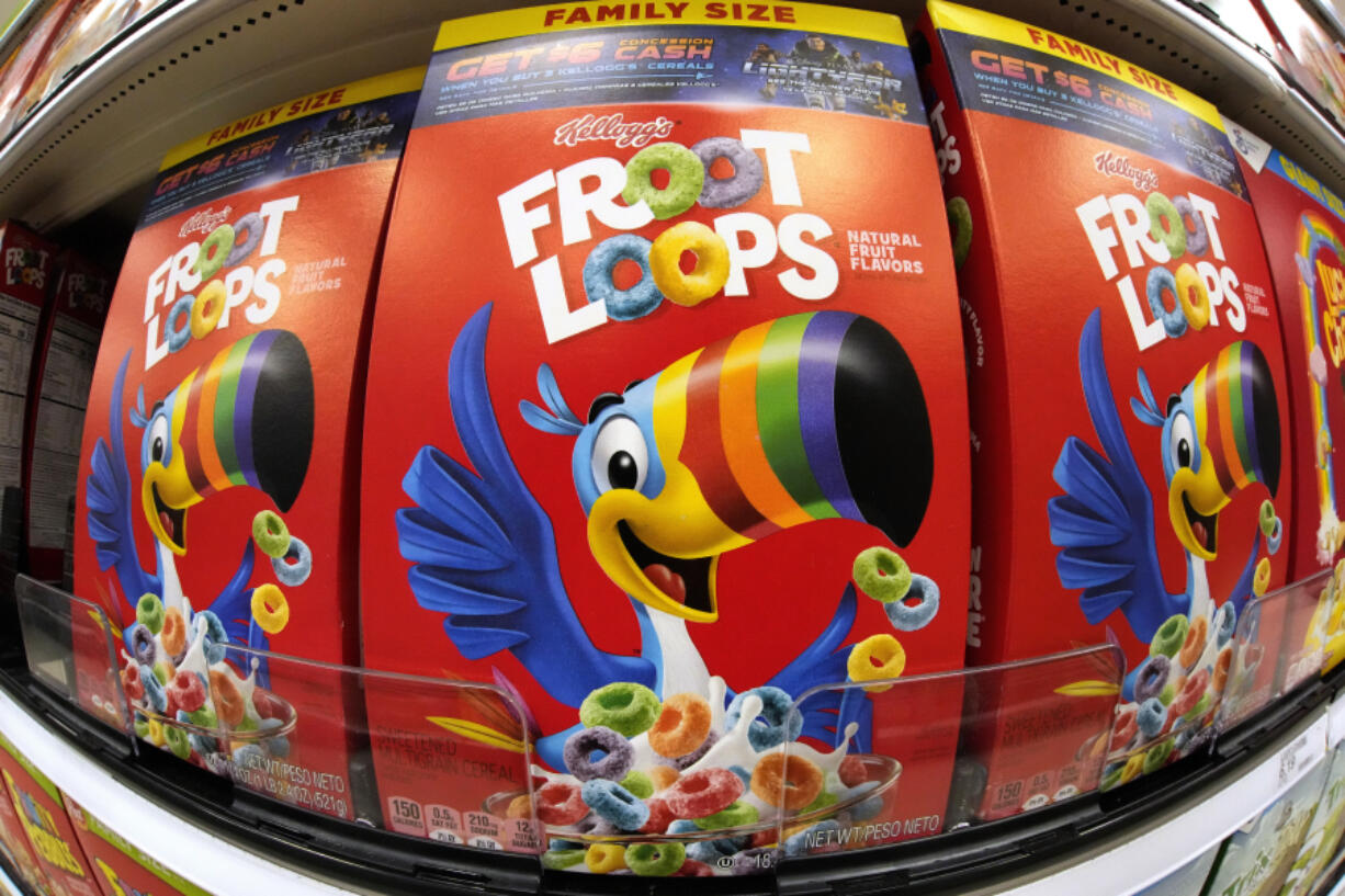 FILE - Boxes of Kellogg&rsquo;s Fruit Loops cereal are displayed in a Target store in Pittsburgh, Nov. 16, 2022. (AP Photo/Gene J.