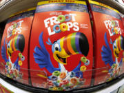 FILE - Boxes of Kellogg&rsquo;s Fruit Loops cereal are displayed in a Target store in Pittsburgh, Nov. 16, 2022. (AP Photo/Gene J.