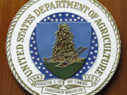 FILE - The logo of the United States Department of Agriculture is seen, Aug. 10, 2007, at the US Embassy in Berlin.