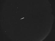 This photo provided by NASA shows the Orionid meteors on Oct. 13, 2015.