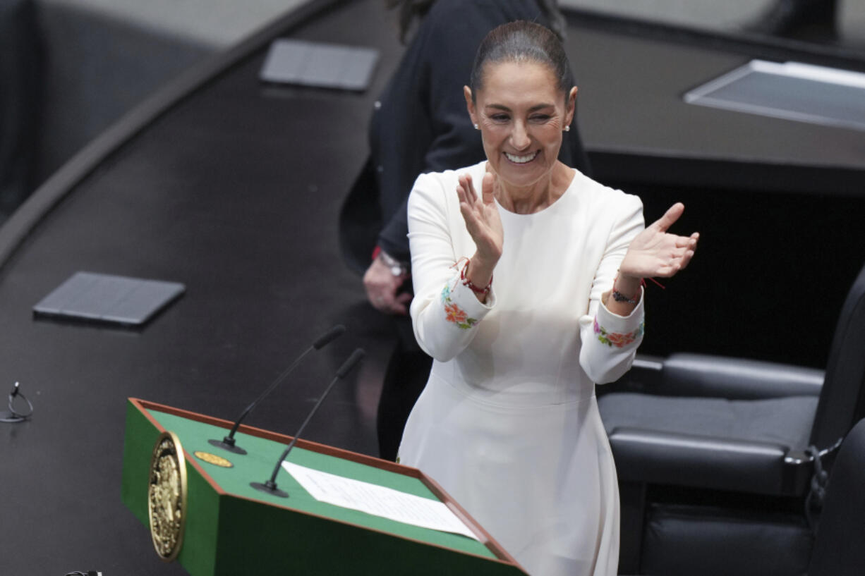 Claudia Sheinbaum applauds during her swearing-in ceremony as Mexico&#039;s new president at Congress in Mexico City, Tuesday, Oct. 1, 2024.