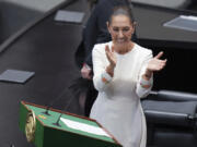 Claudia Sheinbaum applauds during her swearing-in ceremony as Mexico&#039;s new president at Congress in Mexico City, Tuesday, Oct. 1, 2024.