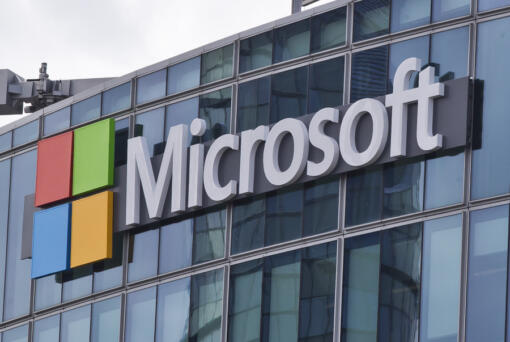 FILE - This April 12, 2016, file photo shows the Microsoft logo in Issy-les-Moulineaux, outside Paris, France. Russia, China and Iran are expanding their partnerships with cyber criminals to conduct cyberespionage and cyberattacks against the U.S. and other nations, according to a new report from Microsoft. Analysts at the tech giant say partnerships between authoritarian governments and criminal networks have benefits for both sides, increasing the volume and effectiveness of the cyber operations while giving criminals new avenues to profit and protection from prosecution.