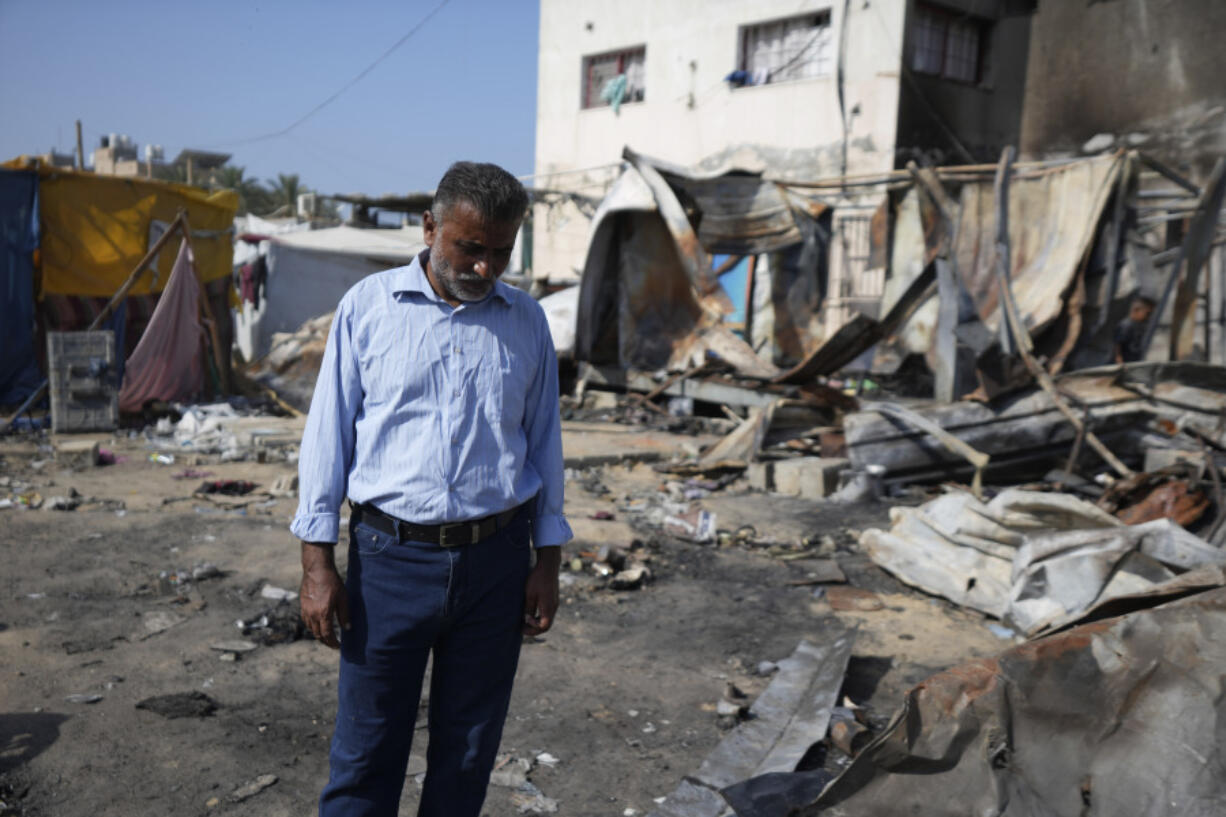 Abdel-Hayy Shaban al-Dalu, at the site where his nephew, Shaban, was killed in a fire after an Israeli strike hit a tent area in the courtyard of Al Aqsa Martyrs hospital in Deir al-Balah, Gaza Strip, Wednesday, Oct. 16, 2024.