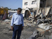 Abdel-Hayy Shaban al-Dalu, at the site where his nephew, Shaban, was killed in a fire after an Israeli strike hit a tent area in the courtyard of Al Aqsa Martyrs hospital in Deir al-Balah, Gaza Strip, Wednesday, Oct. 16, 2024.