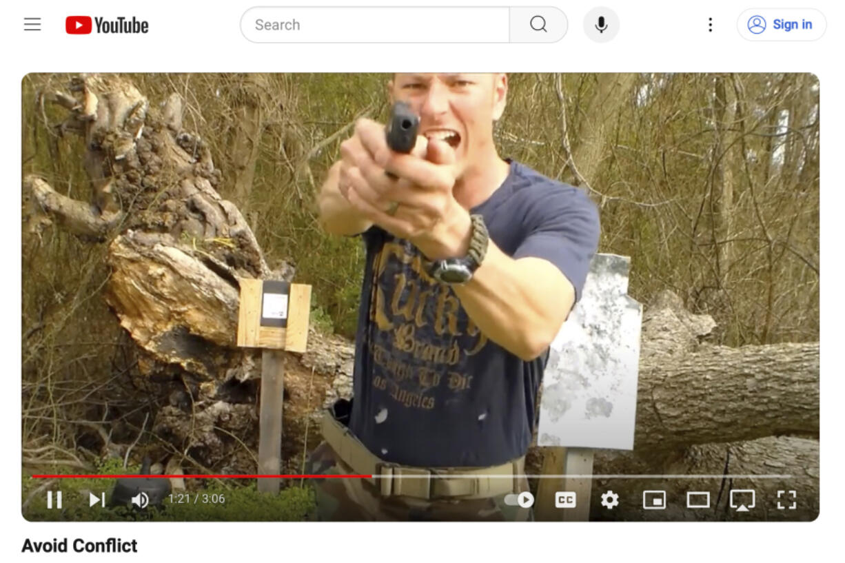 This image from a YouTube video posted by Chris Arthur on March 20, 2018, shows him with a handgun during a training video. Arthur was a member of the North Carolina National Guard at the time he posted the video.