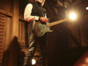 This photo provided by Joe Gorelick for Joe Gorelick Design, LTD, shows guitarist Jake E. Lee.