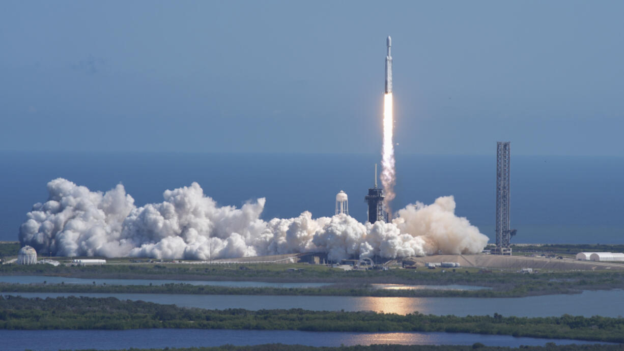 A SpaceX Falcon Heavy rocket with a NASA spacecraft bound for Jupiter lifts off from pad 39A at the Kennedy Space Center Monday, Oct. 14, 2024 in Cape Canaveral, Fla.