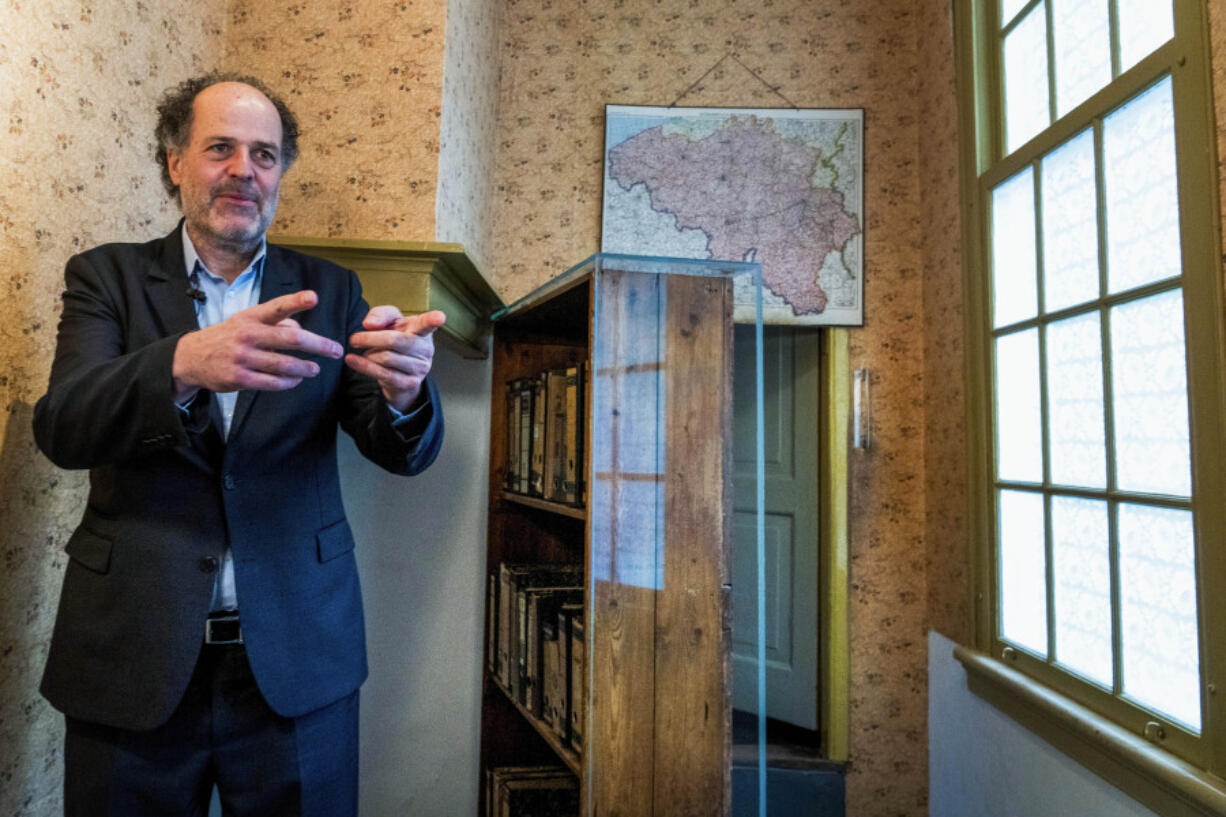 Ronald Leopold, executive director of the Anne Frank House, gestures as he talks Jan. 17, 2022, next to the passage to the secret annex in Amsterdam, Netherlands.