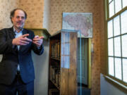 Ronald Leopold, executive director of the Anne Frank House, gestures as he talks Jan. 17, 2022, next to the passage to the secret annex in Amsterdam, Netherlands.