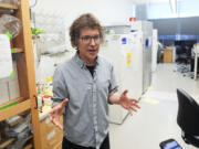 American biochemist David Baker, 2024 Nobel Prize winner in Chemistry, speaks to members of the media during a tour of a lab at the University of Washington on Wednesday, Oct. 9, 2024, in Seattle.