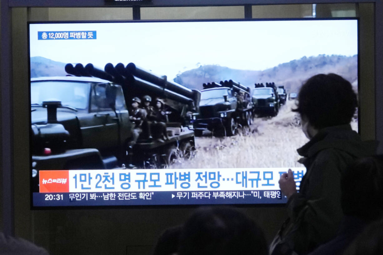 A TV screen shows file images of North Korean soldiers during a news program at Seoul Railway Station in Seoul, South Korea, Friday, Oct. 18, 2024.