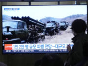 A TV screen shows file images of North Korean soldiers during a news program at Seoul Railway Station in Seoul, South Korea, Friday, Oct. 18, 2024.